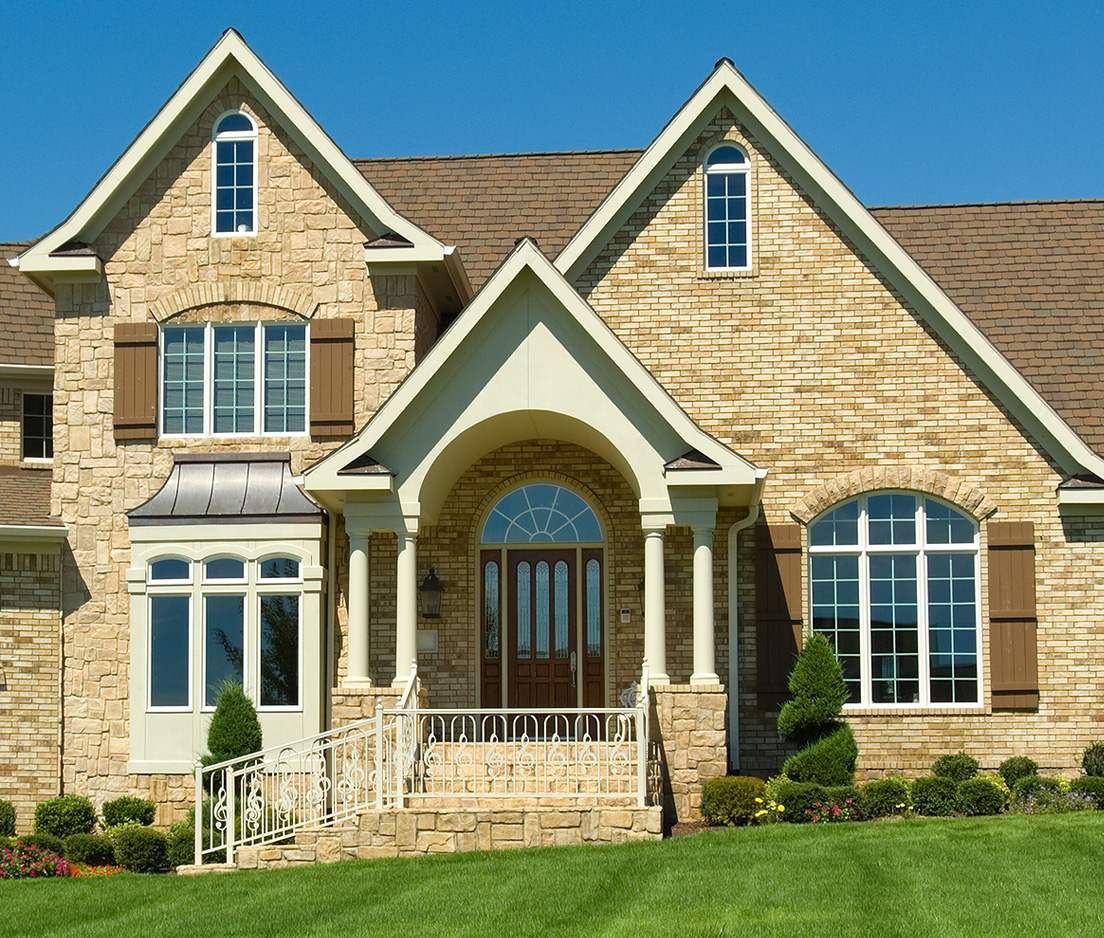 Stone craftsmanship entry of a Liberty custom home